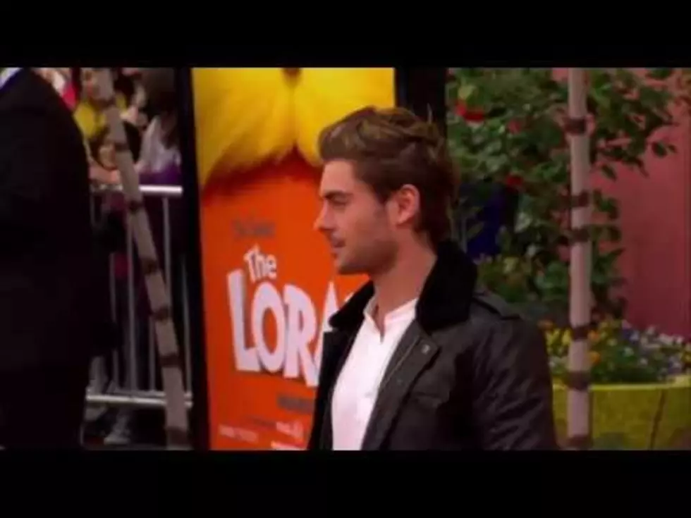 Zac Efron Drops a Condom on the Red Carpet at ‘Lorax’ Premiere [VIDEO]