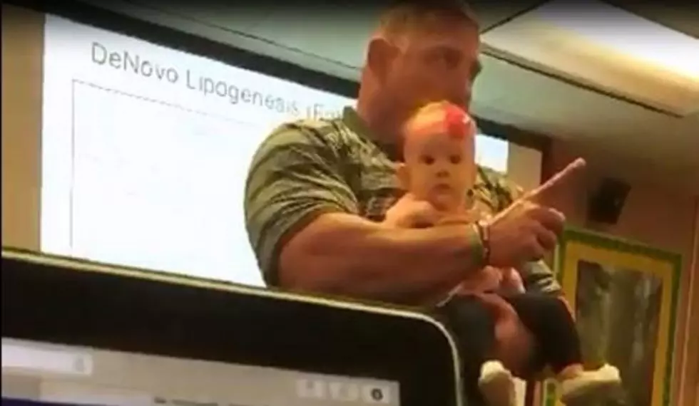 The Good News: Professor Holds Baby During Lecture [VIDEO]