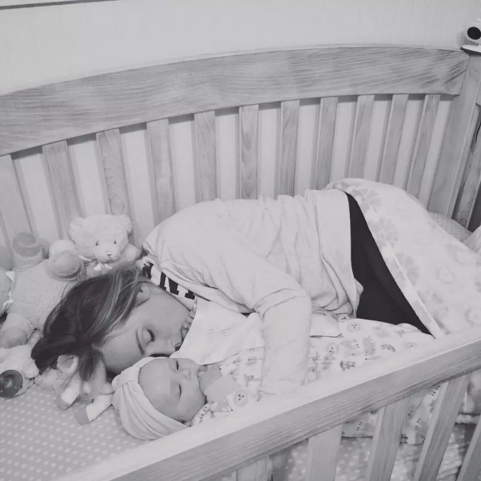 Photo of Michigan Mom in Crib With Her Daughter Goes Viral [PHOTO]
