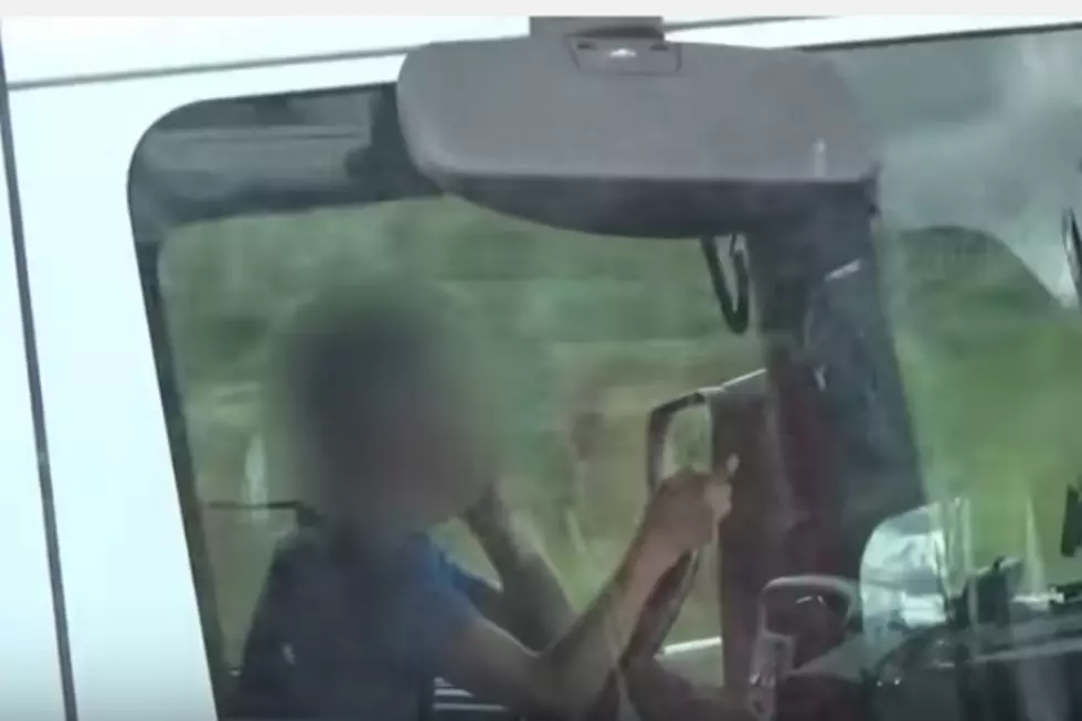 Truck Driver Caught Using Not One, But Two Cellphones [VIDEO]