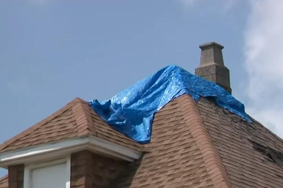Michigan Firefighters Help Cancer Survivor With Roof Damage 
