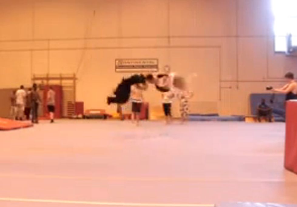 Watch Two Gymnasts Make A Terrible Sound When They Knock Heads After A Crazy Stunt