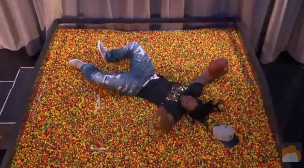 Watch Marshawn Lynch Dive Into an End Zone of Skittles