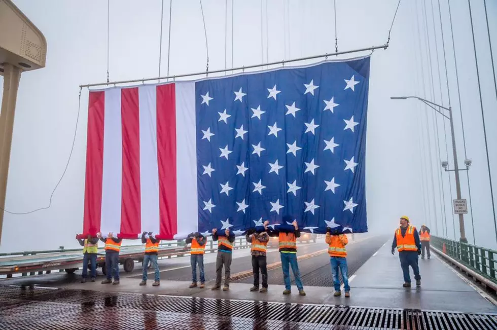 Michigan Honors Fallen Soldiers by Flying Massive American Flag from Mackinac Bridge on Memorial Day