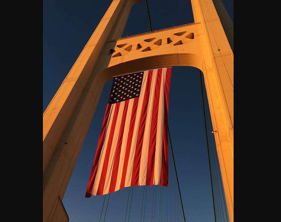 Giant Flag Flown on Mackinac Bridge To Celebrate America on Independence Day