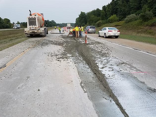 This is the Aftermath of A Motorcycle Driving Through Fresh Concrete on Interstate 69 Near Lansing