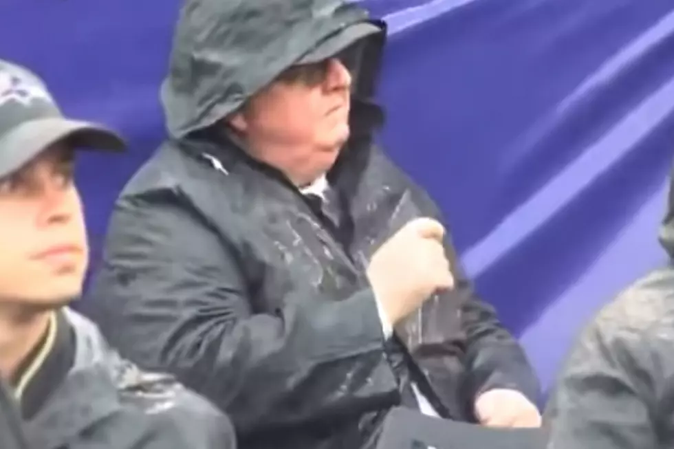 Old Man Caught Air Drumming to Rush During Football Game