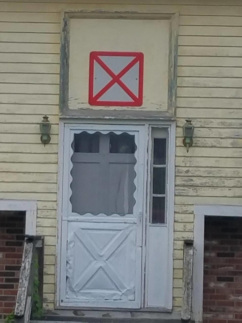 What Does That Red &#8216;X&#8217; Mean On Certain Massachusetts Buildings?