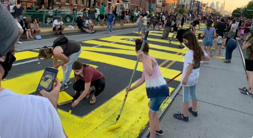 Hundreds of Residents Paint ‘End Racism Now’ in Philly Neighborhood