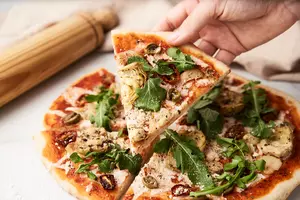 Healthy Pizza with Artichokes, Olives, Tomatoes, and Dairy-Free Cheese