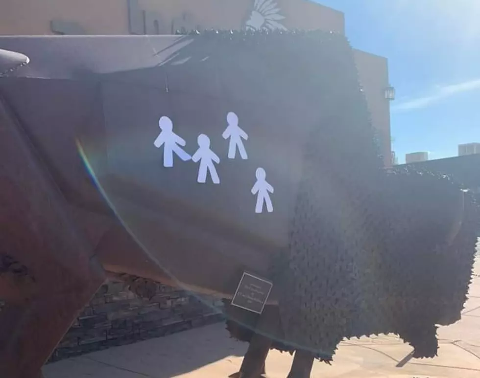 Someone Put Tourist Score Stickers On A Bison Sculpture In Lander, WY