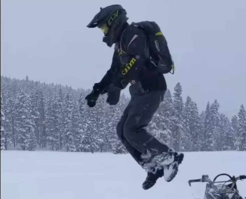 WATCH: Wyoming Snowmobiler Jumps From Ride Into Neck Deep Snow