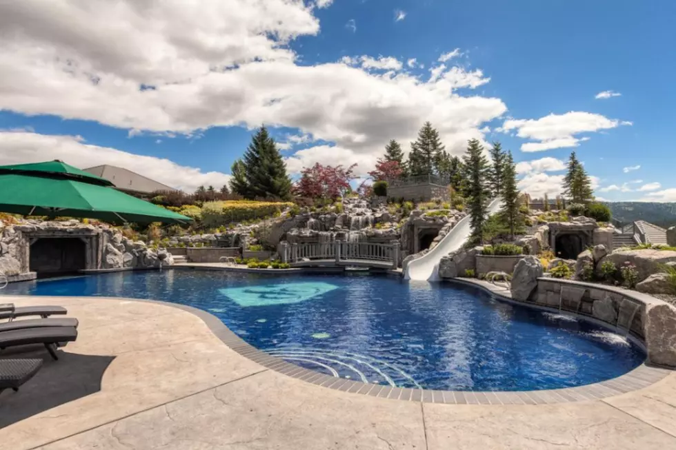 This Idaho Home Has 13 Bedrooms & Baths And A Water Slide Pool