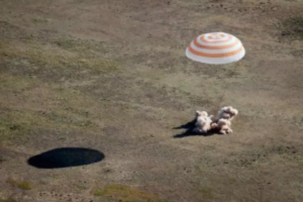 Russian Capsule Brings Three Crew Members Back to Earth