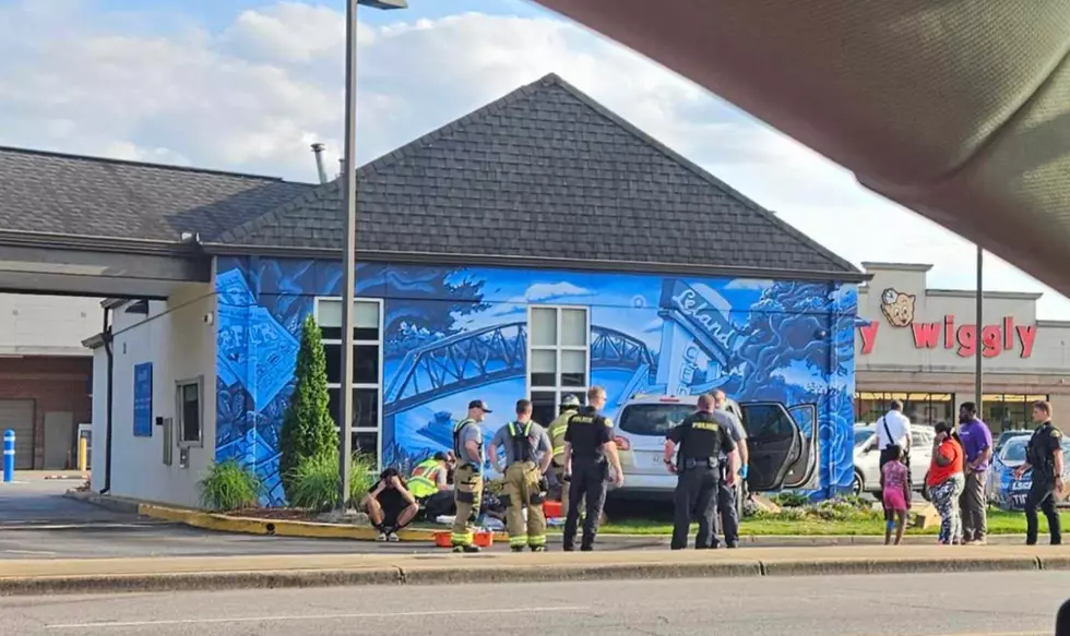 Crash Sends SUV Credit Union in Alberta City, Damaging Mural