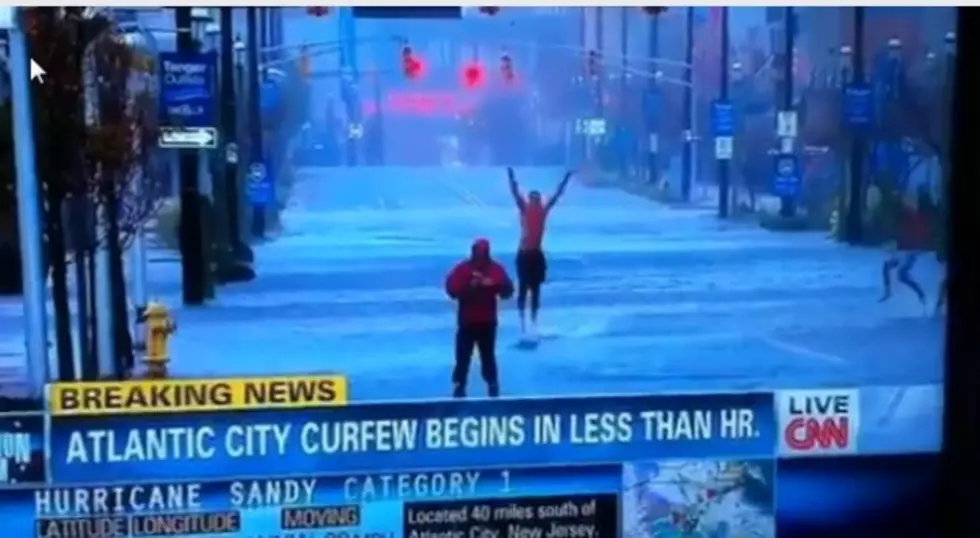 Reporters Get Photobombed During Hurricane Sandy Coverage [VIDEO]