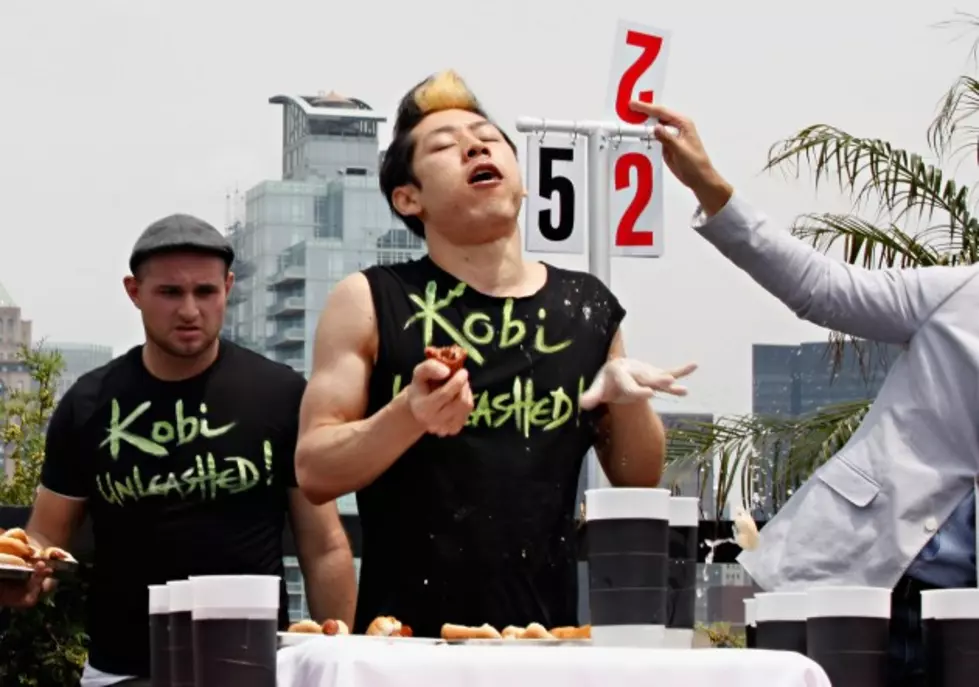 Watch Competetive Eater Takeru Kobayashi Take On A Cheerleading Squad [VIDEO]