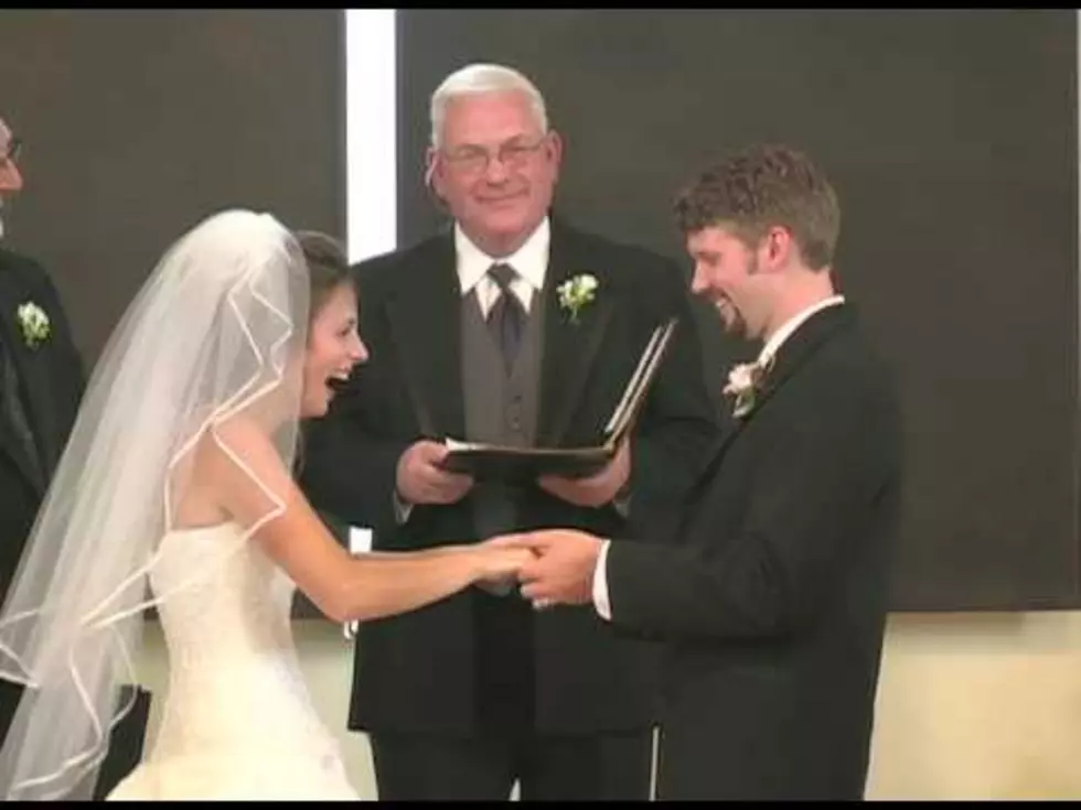 Bride Can&#8217;t Stop Laughing After Groom Flubs His Vows [VIDEO]