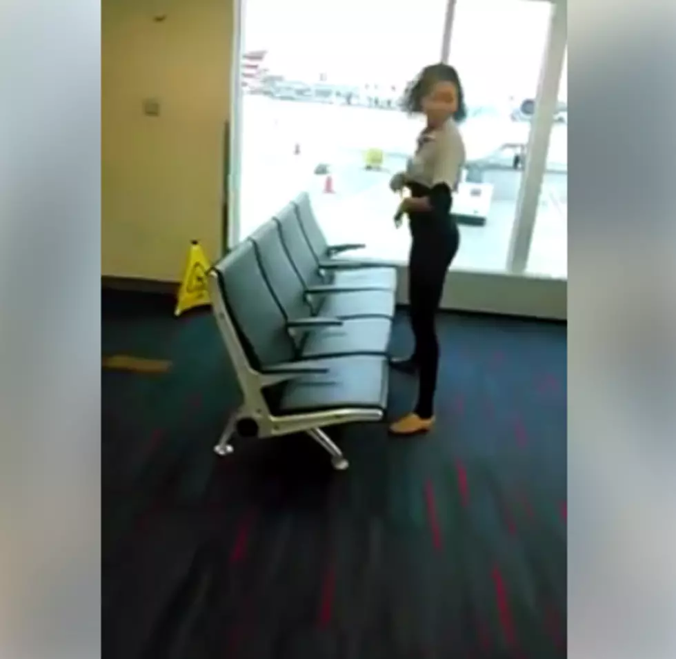 WATCH: Buffalo Girl Limbos Under The Airport Seats + Everyone&#8217;s In Shock [VIDEO]