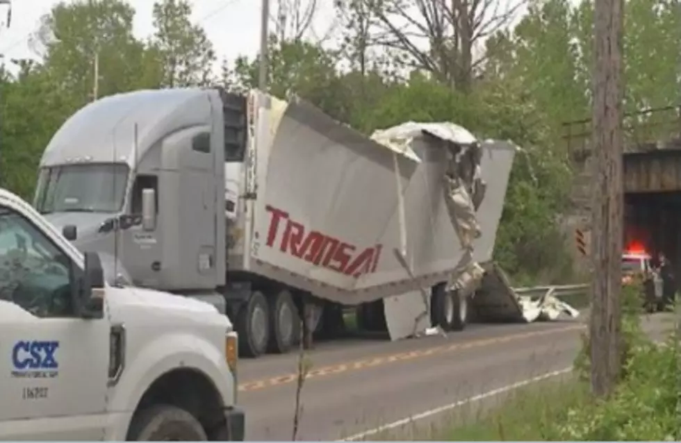 Tractor-trailer Hits The Big Tree Road Overpass