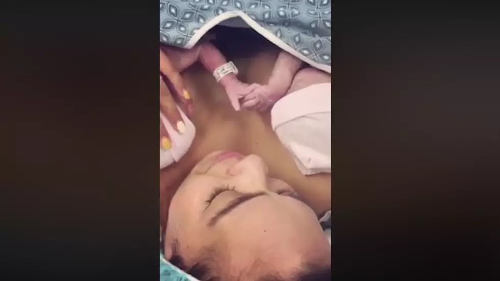 Amazing Video Shows Twins Holding Hands After Birth