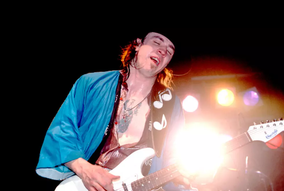 stevie ray vaughan playing guitar