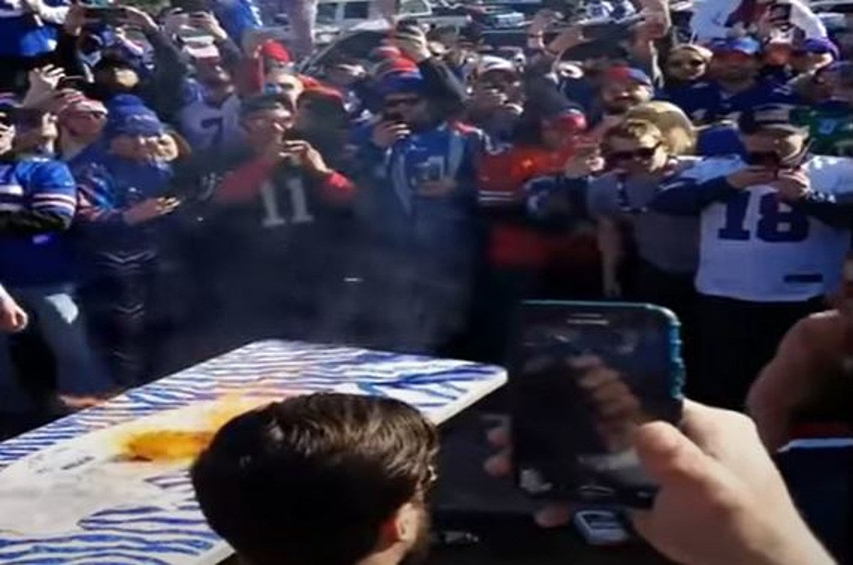 Bills Fan Table Jump Fails Big [VIDEO]