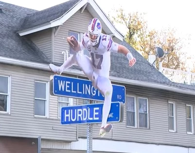 Buffalo Quarterback Jumping Over Christmas Tree Topper