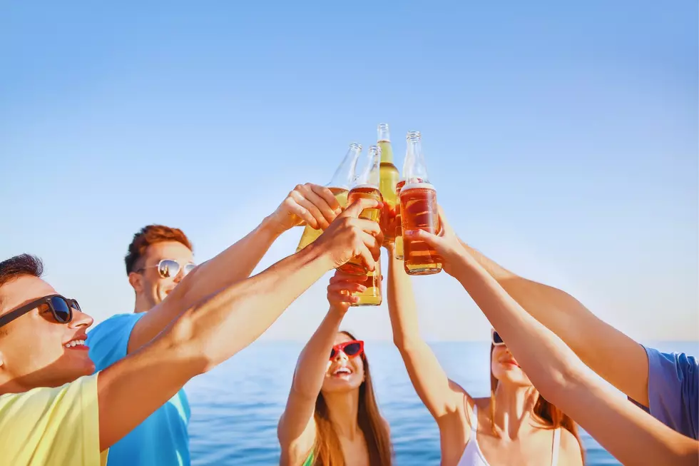 Young adults toasting beers