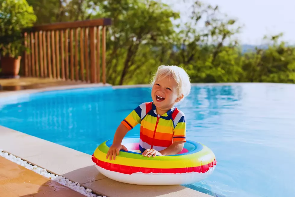 child in swimming pool