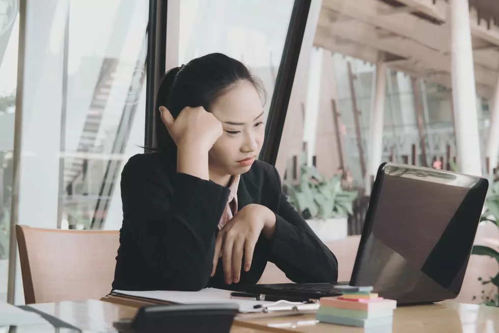 Woman tired at desk