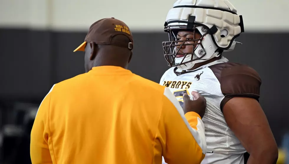 Wyoming's new defensive tackles coach is shacking up in the dorms