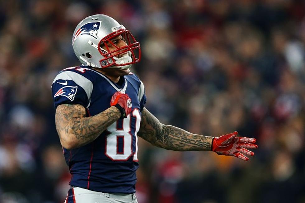Pats Player Hernandez Taken From Home in Handcuffs