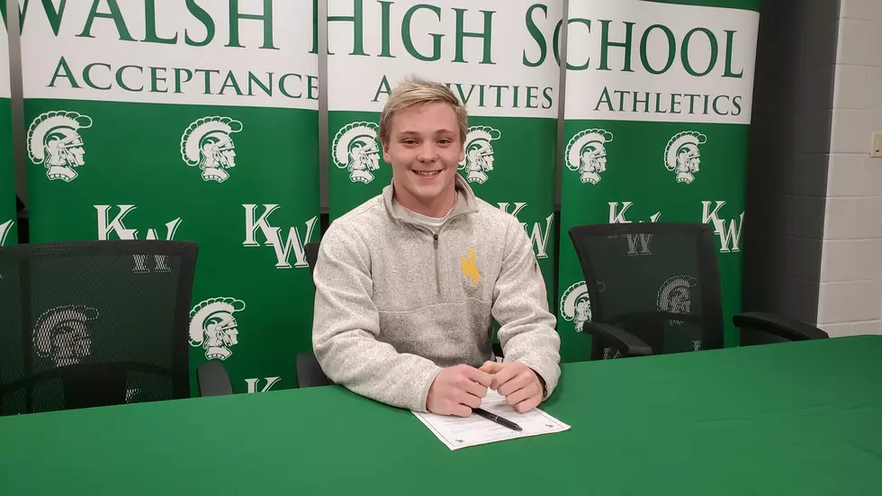 KW Swimmer Signs With UW