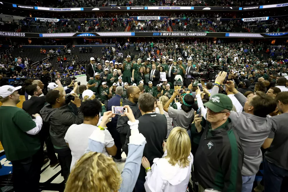 The Latest: Only Staff, Limited Family at NCAA Tourney Games