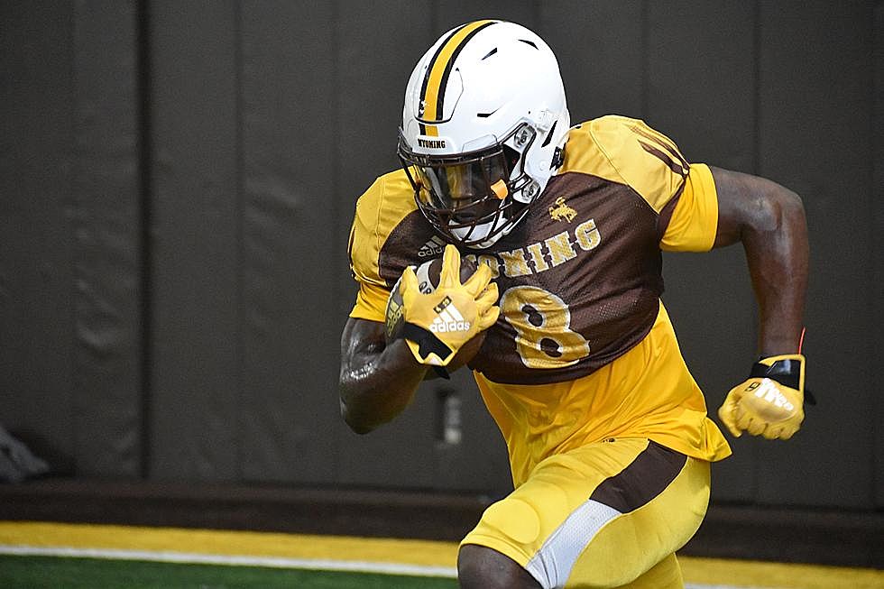 Wyoming Cowboys Team-Issued #64 White Jersey from the Football Program