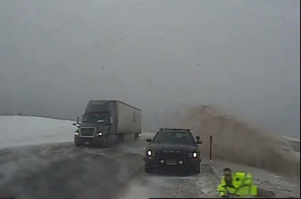 VIDEO: Wyoming Highway Patrol Trooper Almost Hit By Car Due To Winter Weather Conditions