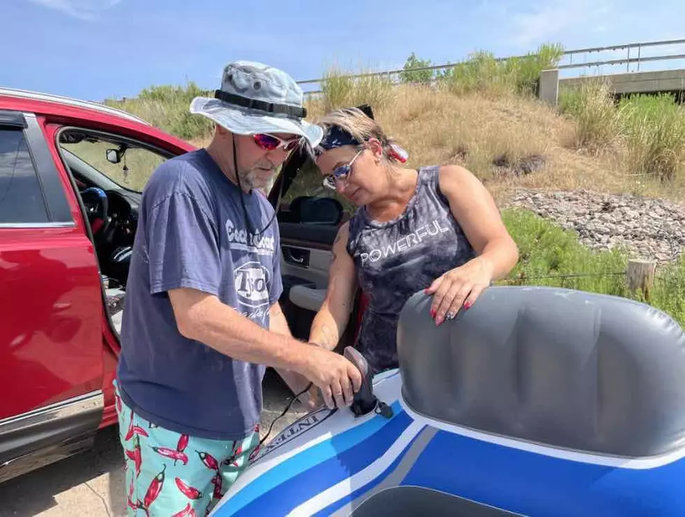 Glenn and Crystal St. Gelais pump a river tube. Tom Morton, Townsquare Media