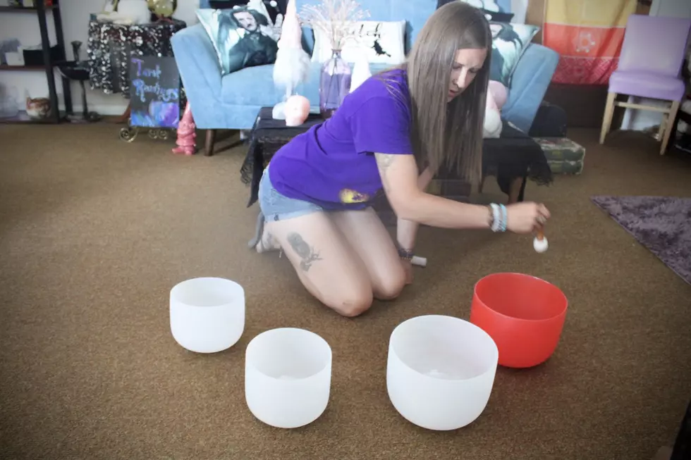 Cassie Puhrman sounds the bowls; photo by Kolby Fedore, TSM