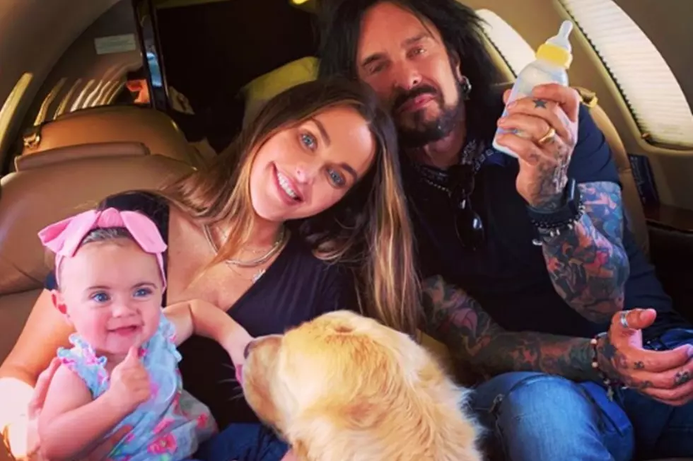 Nikki Sixx of Motley Crue in Wyoming with a Baby Bottle
