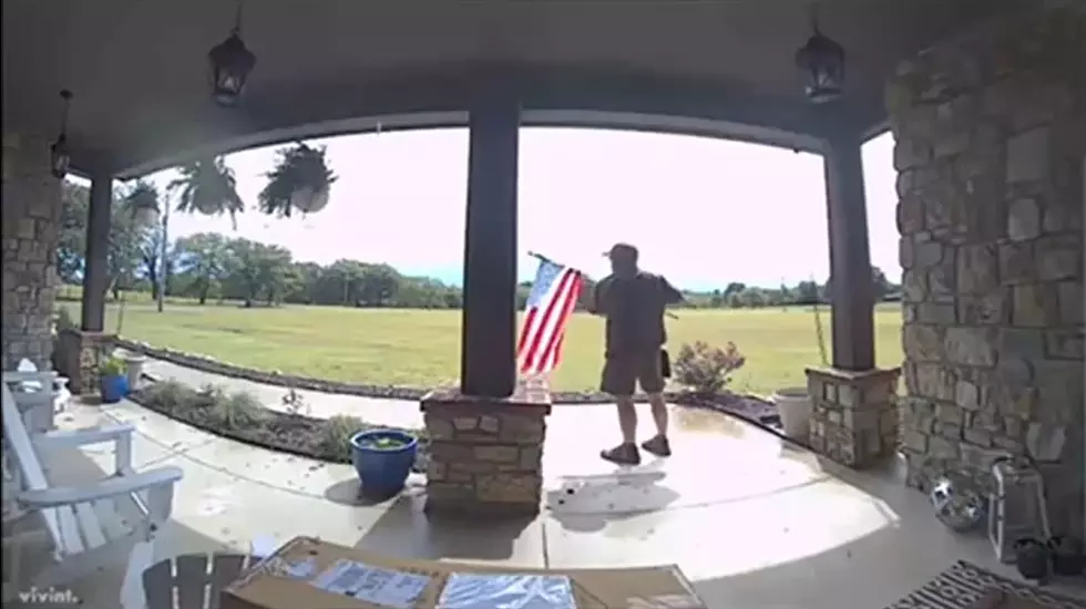 Watch a Hero UPS Driver Take the Time to Fix American Flag