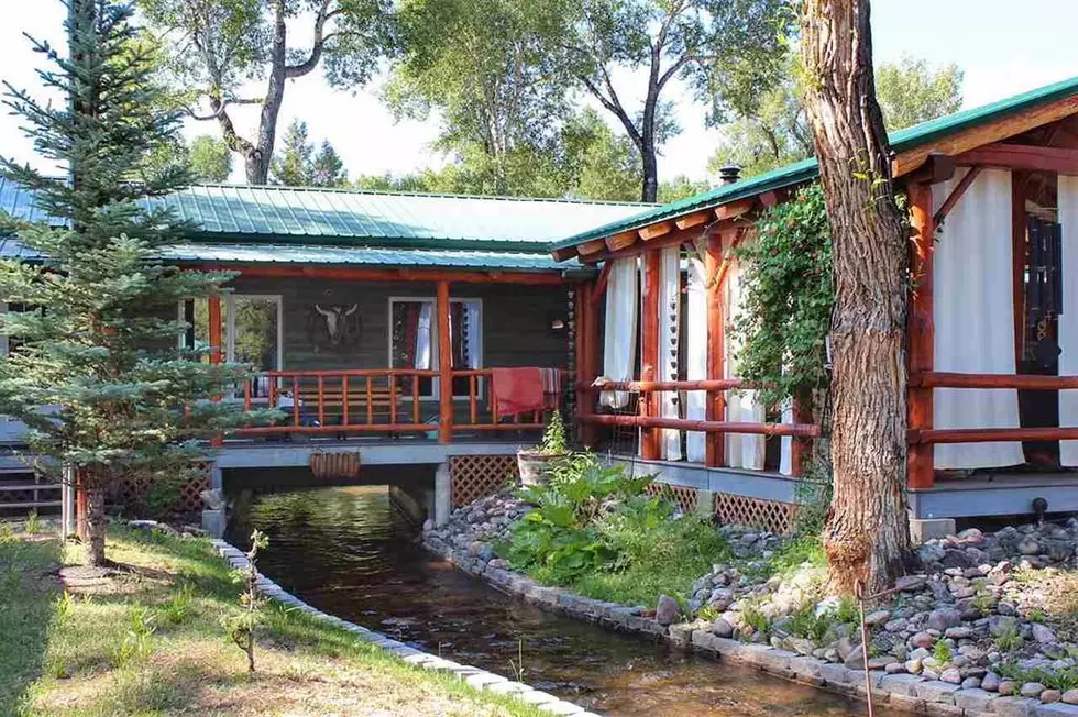 10 Pics of a Wyoming Log Cabin with a Canal Running Under It
