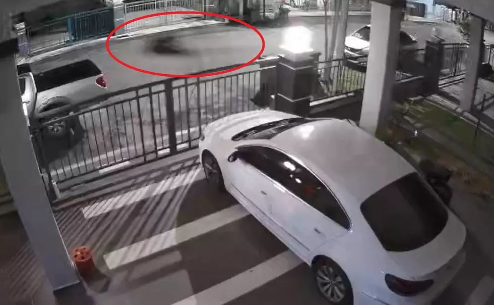 Watch a Strange Apparition Appear on a Garage Security Camera