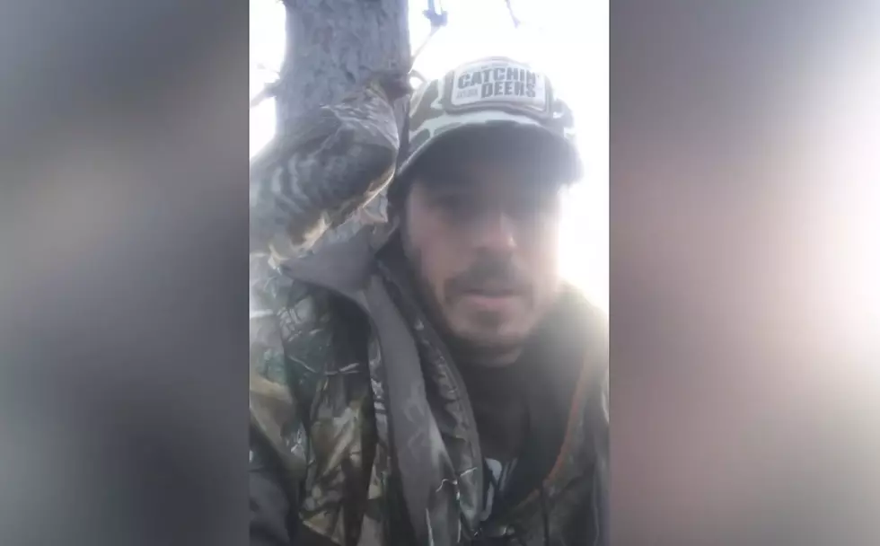 Deer Hunter Tries to Stay Quiet While Getting Pecked By a Bird