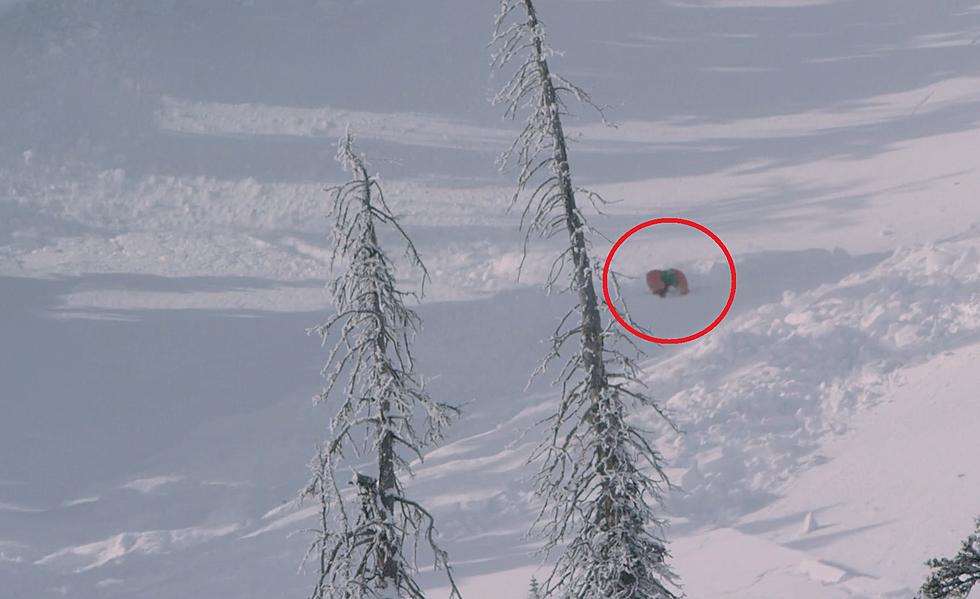 Watch Wyoming Snowmobiler Get Caught in Avalanche and Survive