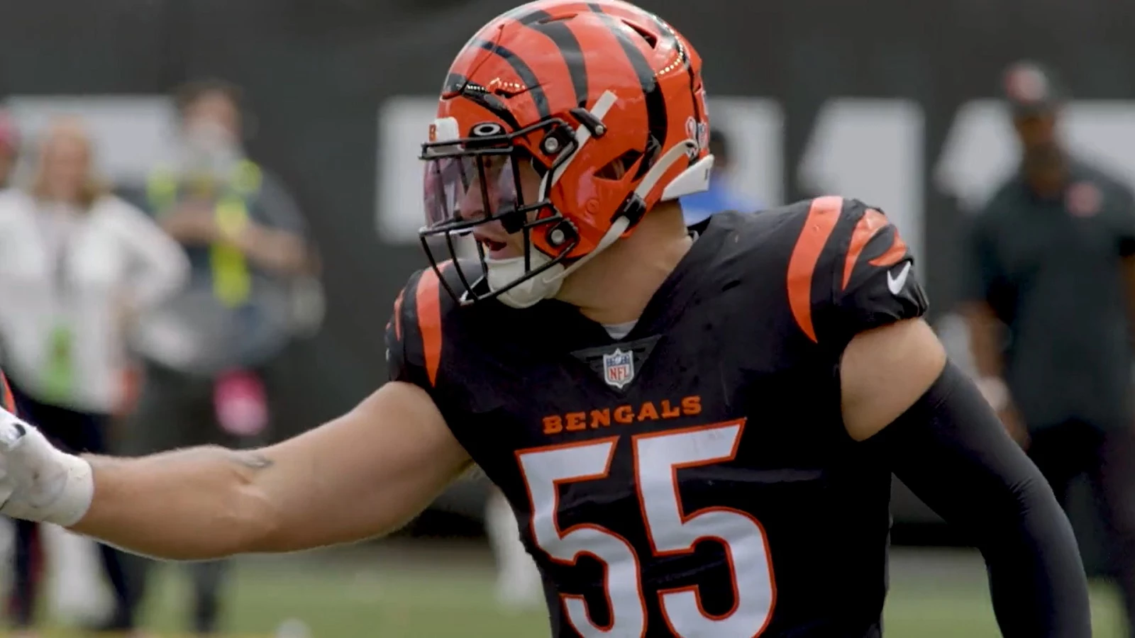 Cincinnati Bengals linebacker Logan Wilson (55) hits Philadelphia Eagles  quarterback Carson Wentz (11) as he was