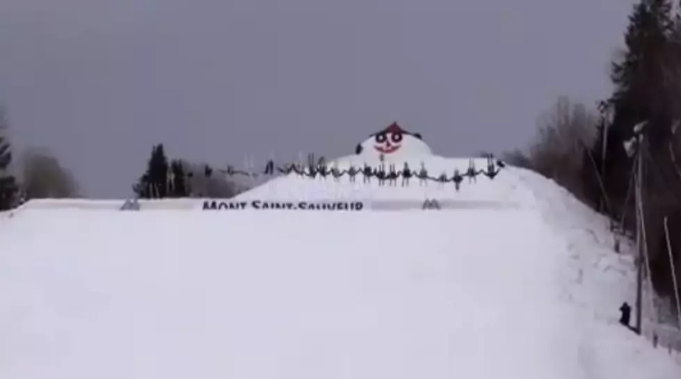 Skiers Perform 30-person Backflip [Video]