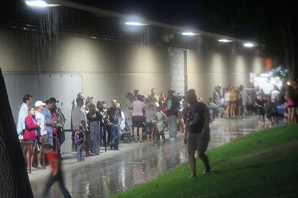 2013 Fireworks Festival Goers Take Shelter During Sudden Down Pour [PHOTOS]