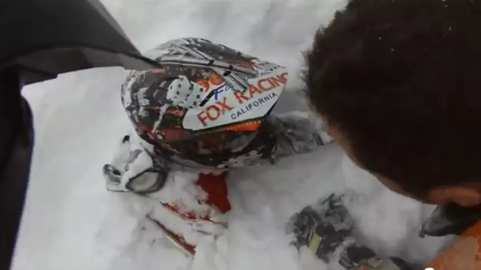 Snowmobiler Caught In Avalanche And Rescued [VIDEO]
