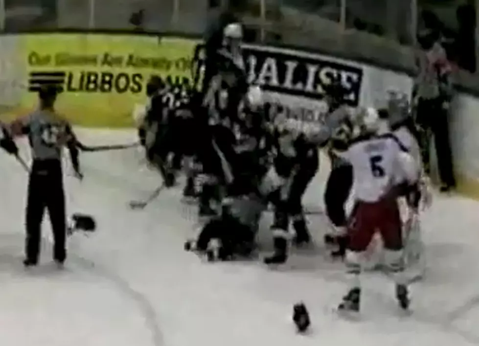 Hockey Player Tries To Fight Entire Opposing Team [VIDEO]